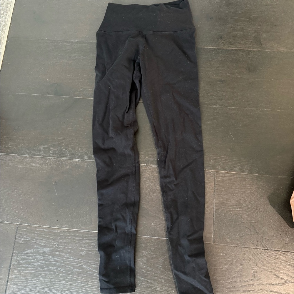 Black aloleggings with mesh line down the back